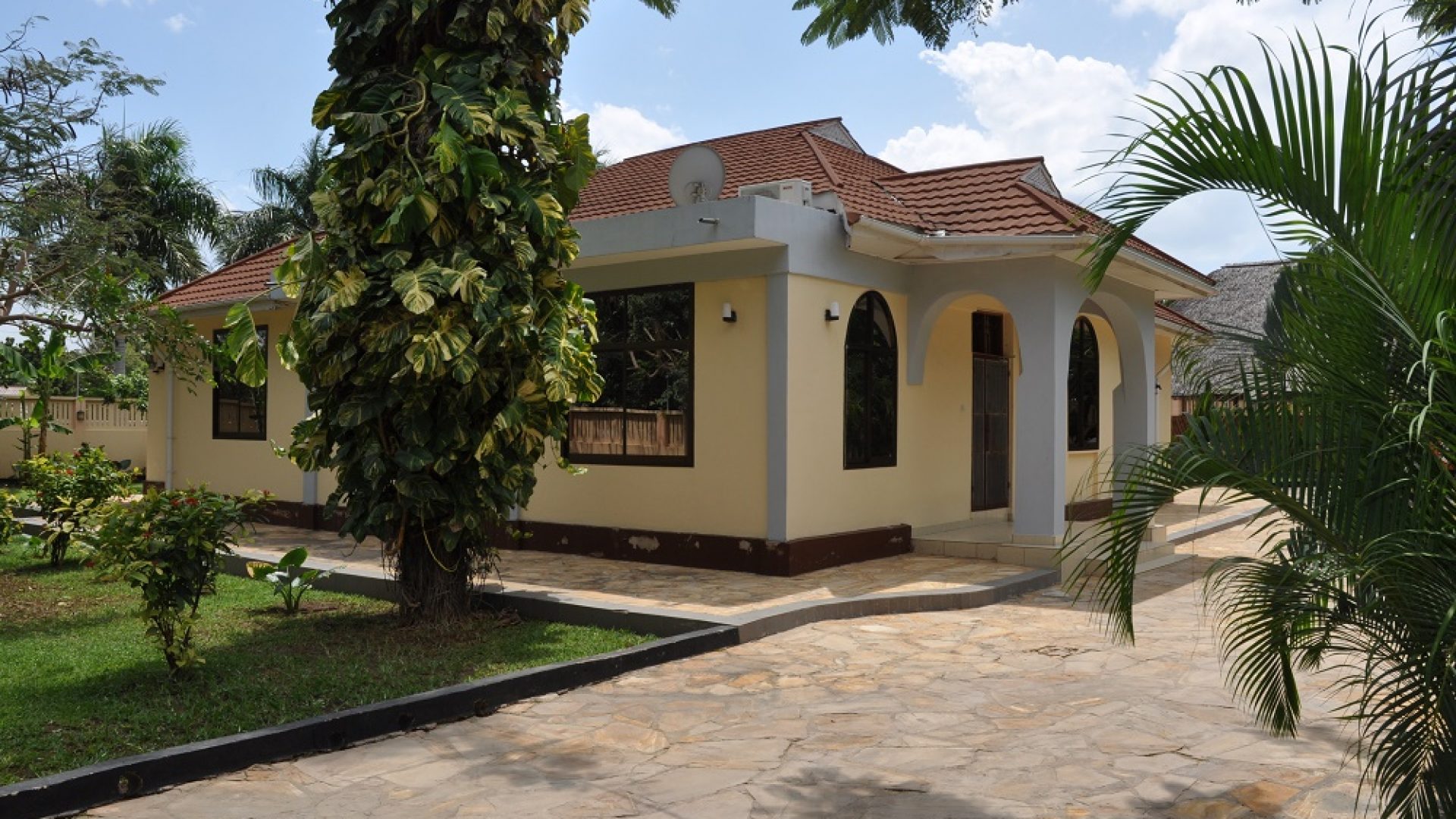Side View of Rental Home in Oysterbay by Tanganyika Estate Agents