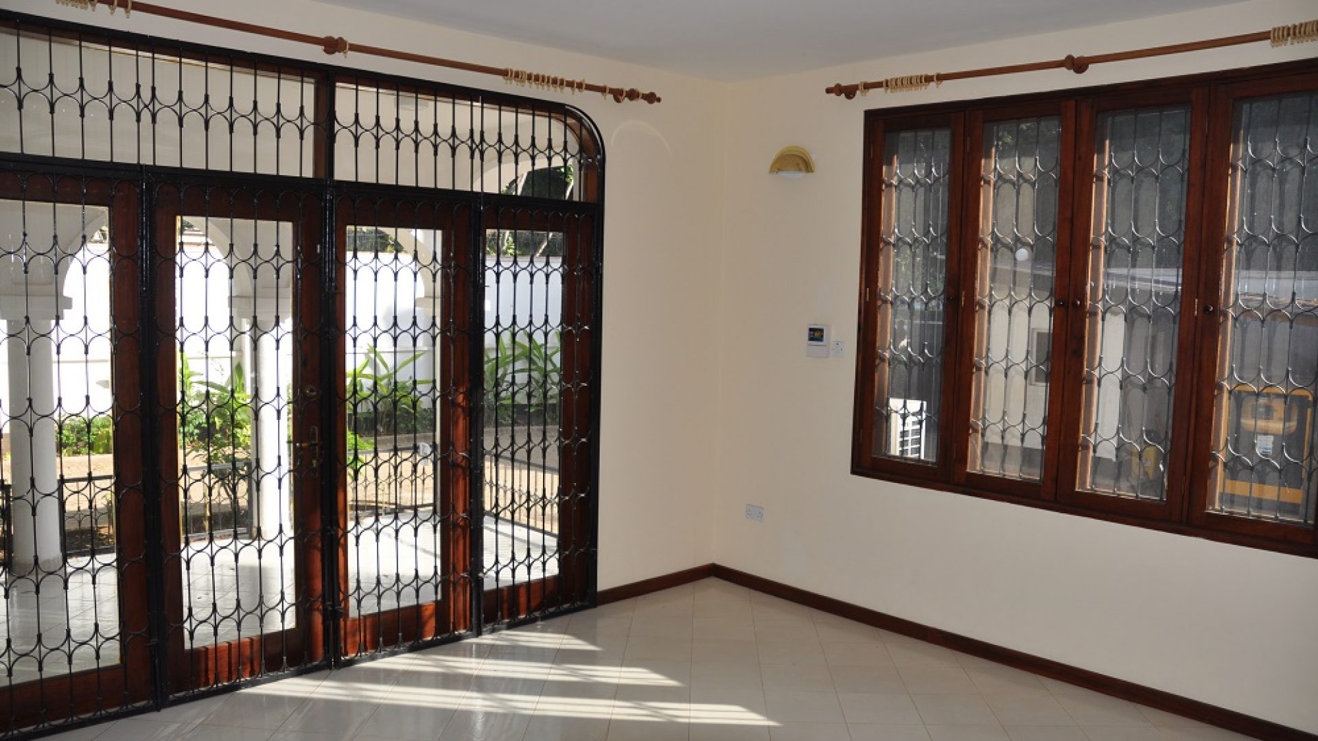 Living Room Rental Standalone House in Masaki by Tanaganyika Estate Agents