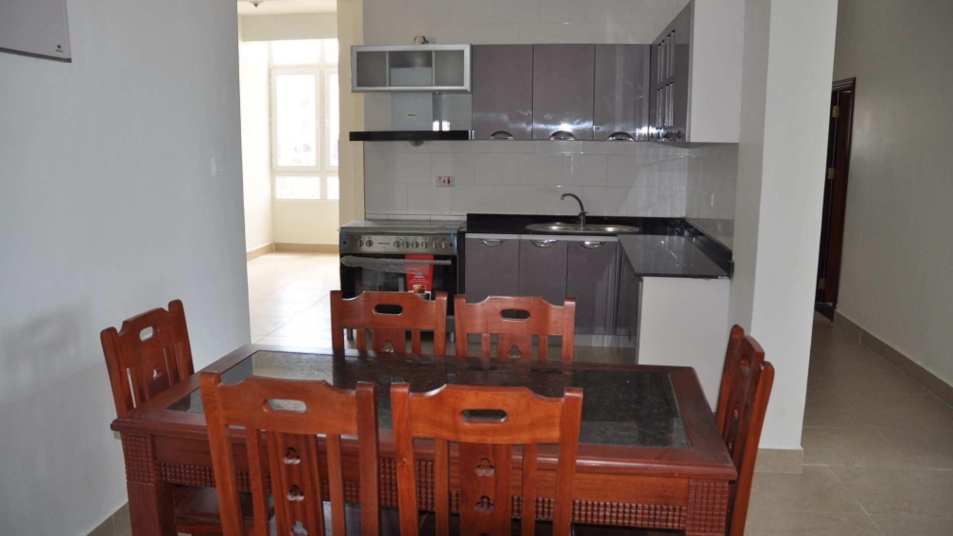 Dining Room & Kitchen of the Four Bedroom Furnished Condos in Masaki, Dar es Salaam by Tanganyika Estate Agents