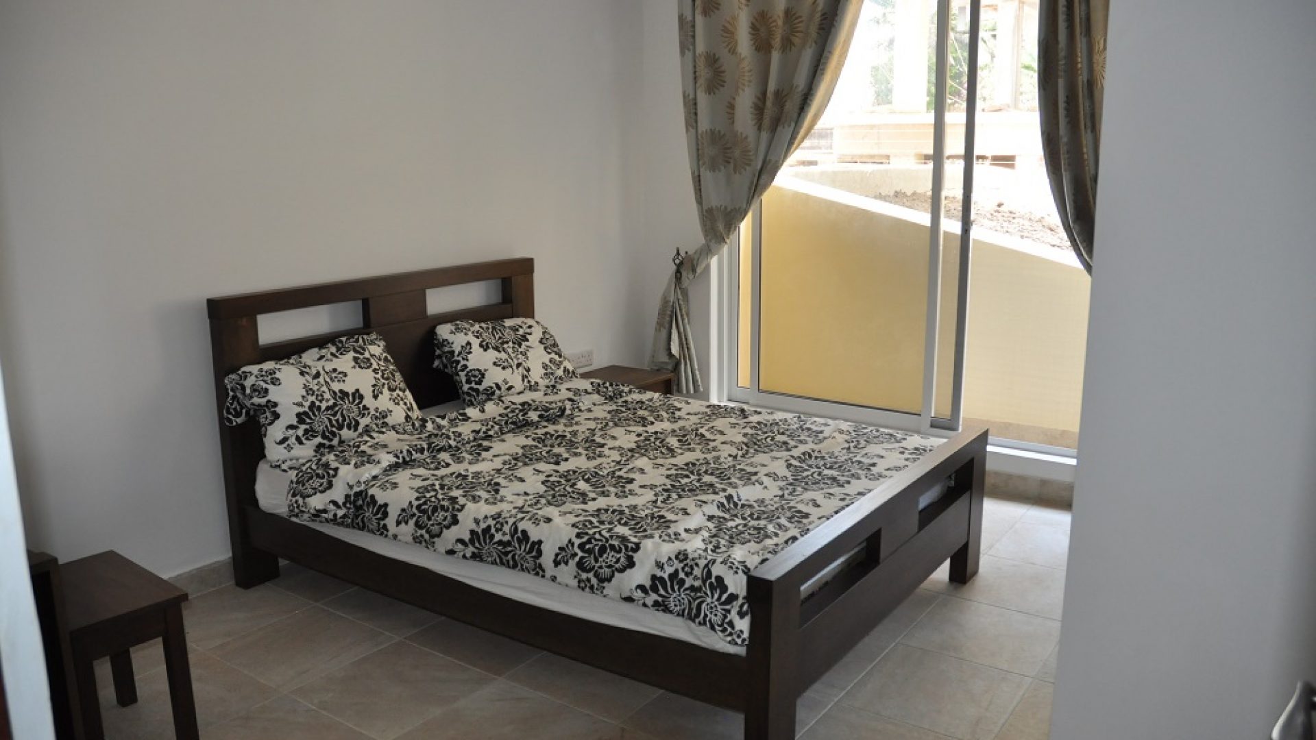 Bedroom of the 2 Bedroom Furnished Apartments in Masaki Dar es Salaam by Tanganyika Estate Agents