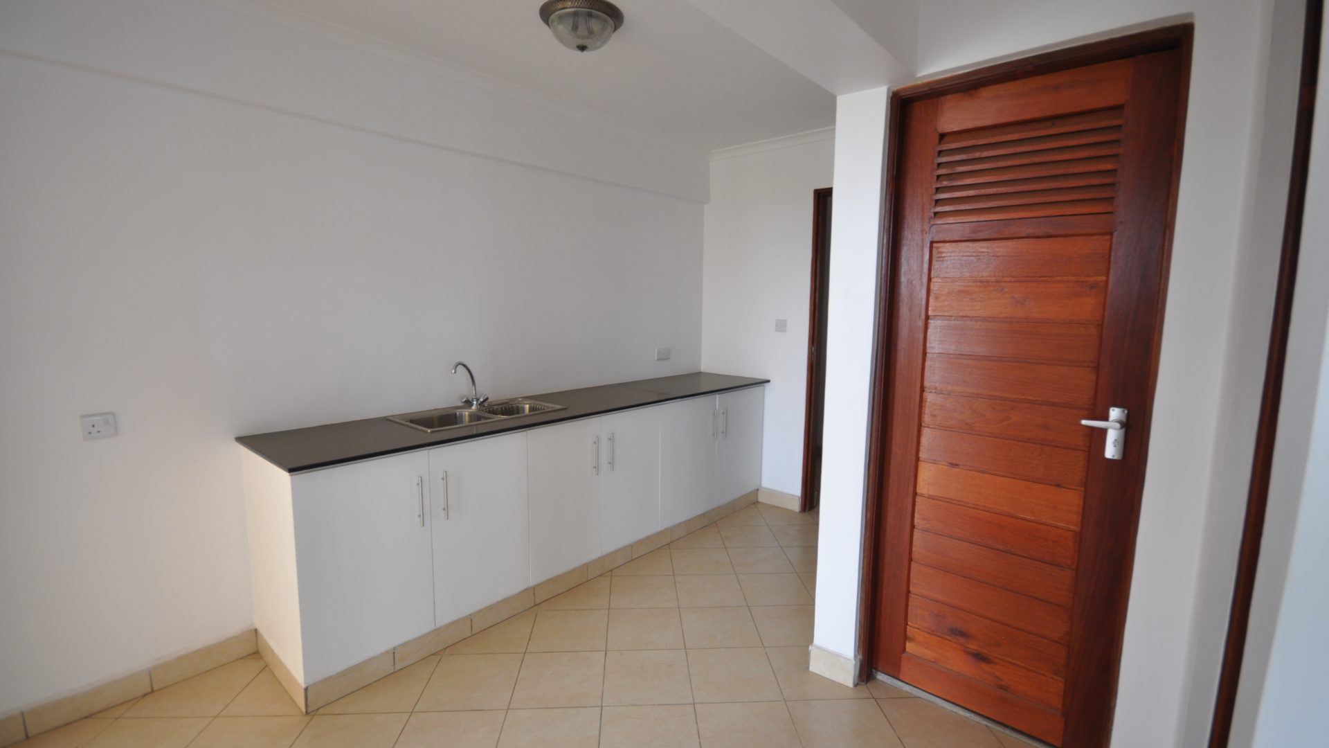A Kitchen of the Commercial Building for Sale in Sakina, Arusha by Tanganyika Estate Agents