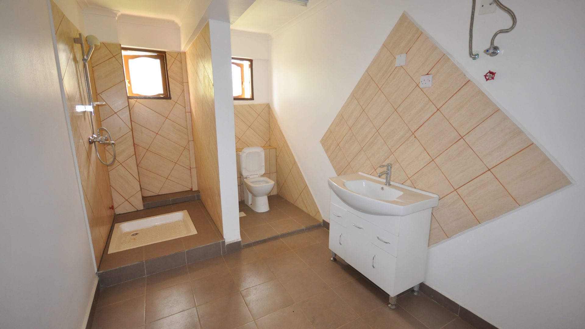 A Bathroom of the Commercial Building for Sale in Sakina, Arusha by Tanganyika Estate Agents