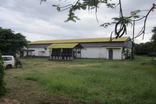 A Building on the Industrial Plot for Sale in Kilwa Masoko by Tanganyika Estate Agents