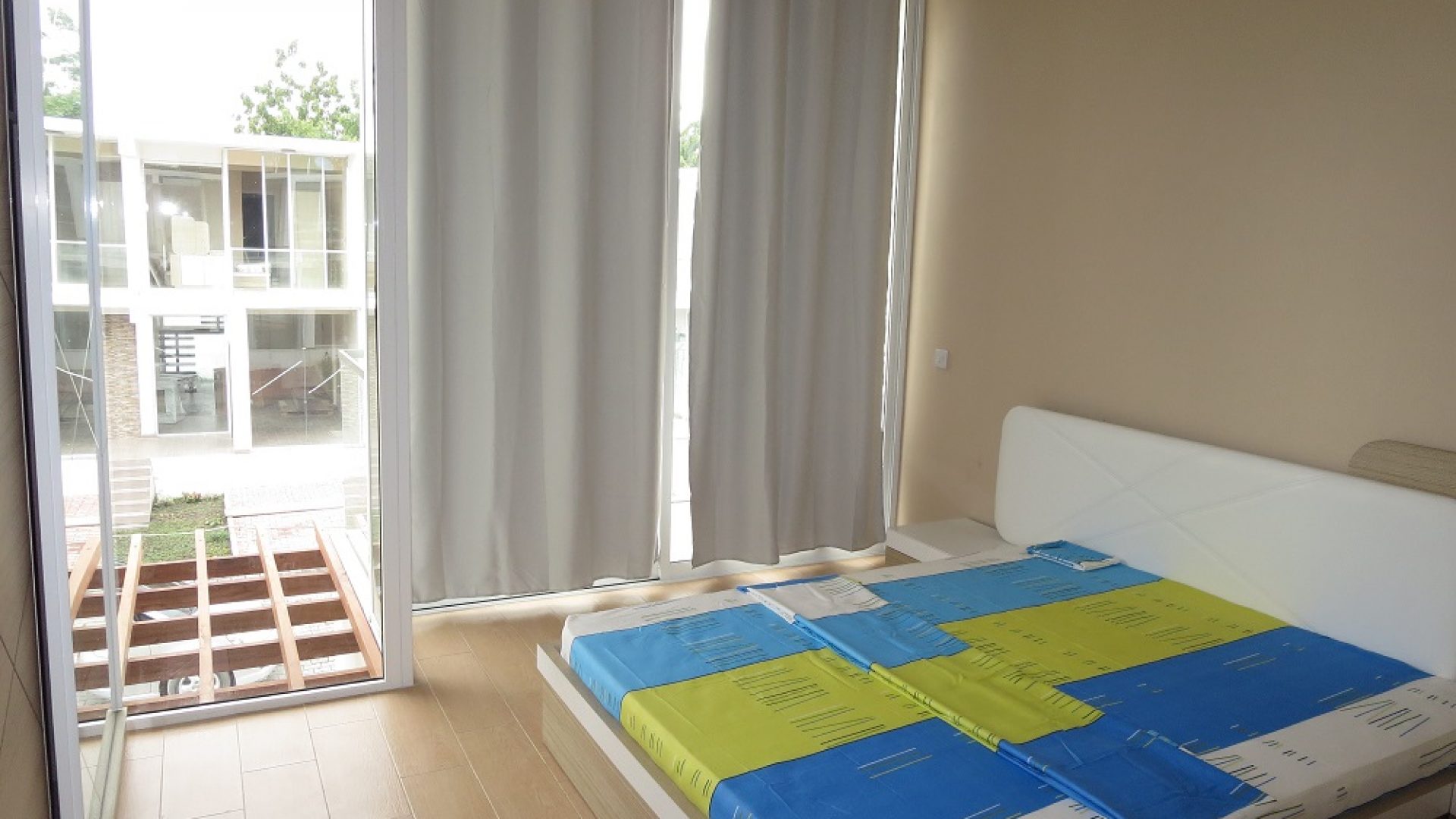 Bed in Bedroom of the Furnished Houses in Masaki, Dar es Salaam by Tanganyika Estate Agents