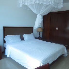 A Bedroom in the 3 Bedroom Furnished Apartment in Oyster Bay Dar es Salaam by Tanganyika Estate Agents