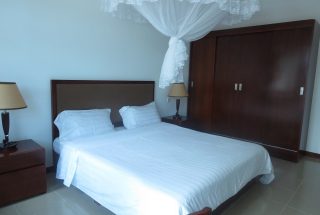 A Bedroom in the 3 Bedroom Furnished Apartment in Oyster Bay Dar es Salaam by Tanganyika Estate Agents