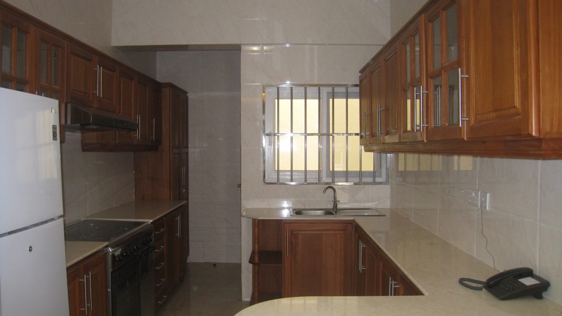 Kitchen in the Two Bedroom Furnished Flats in Oyster Bay Dar es Salaam by Tanganyika Estate Agents