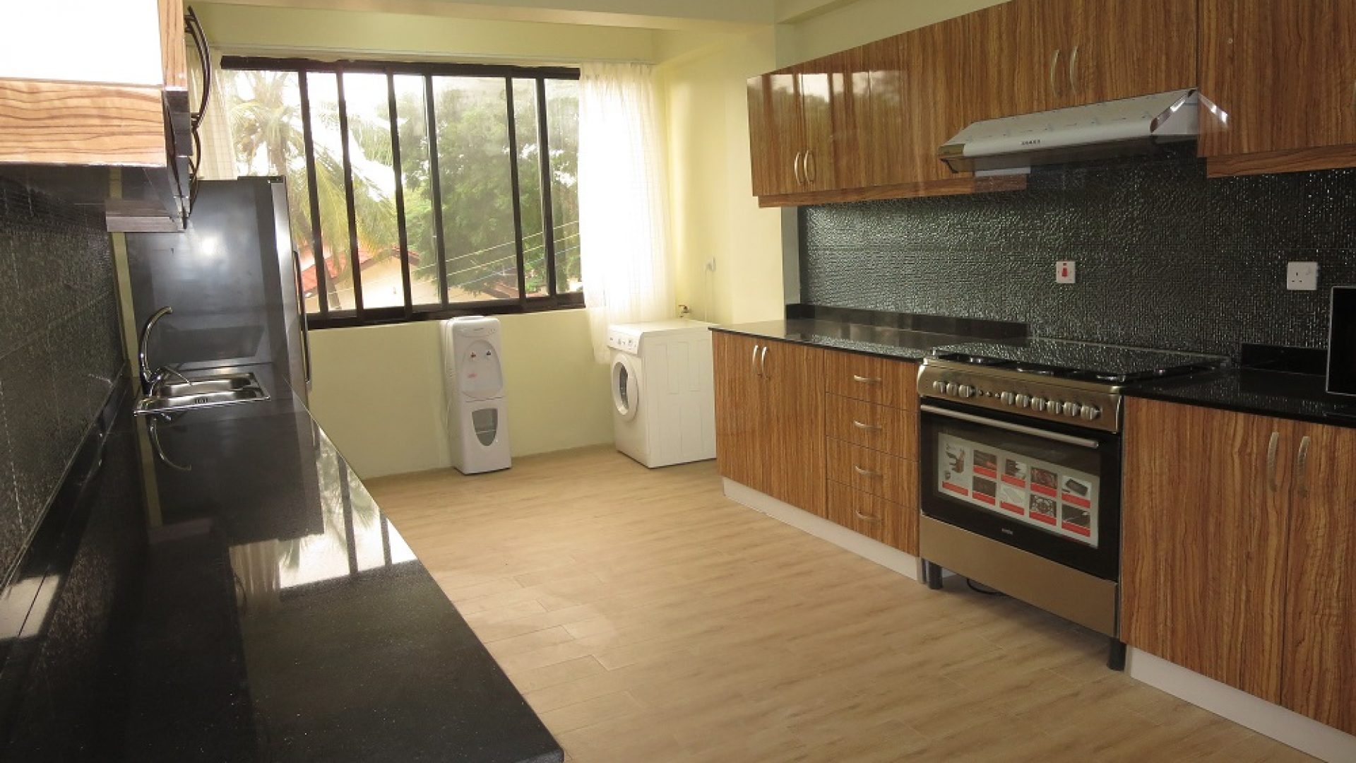 A Kitchen in the 2 Bedroom Furnished Apartments in Masaki by Tanganyika Estate Agents