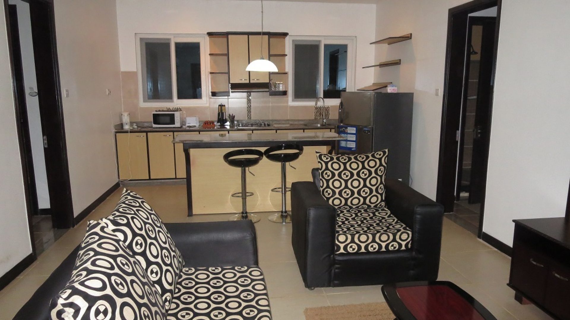 Living & Dining Rooms of the Two Bedroom Furnished House in Masaki, Dar es Salaam by Tanganyika Estate Agents