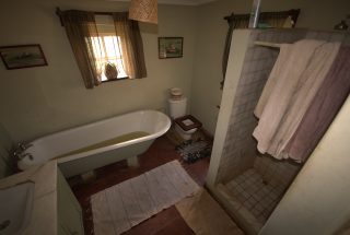 Bathroom of the Furnished Cottage by Tanganyika Estate Agents