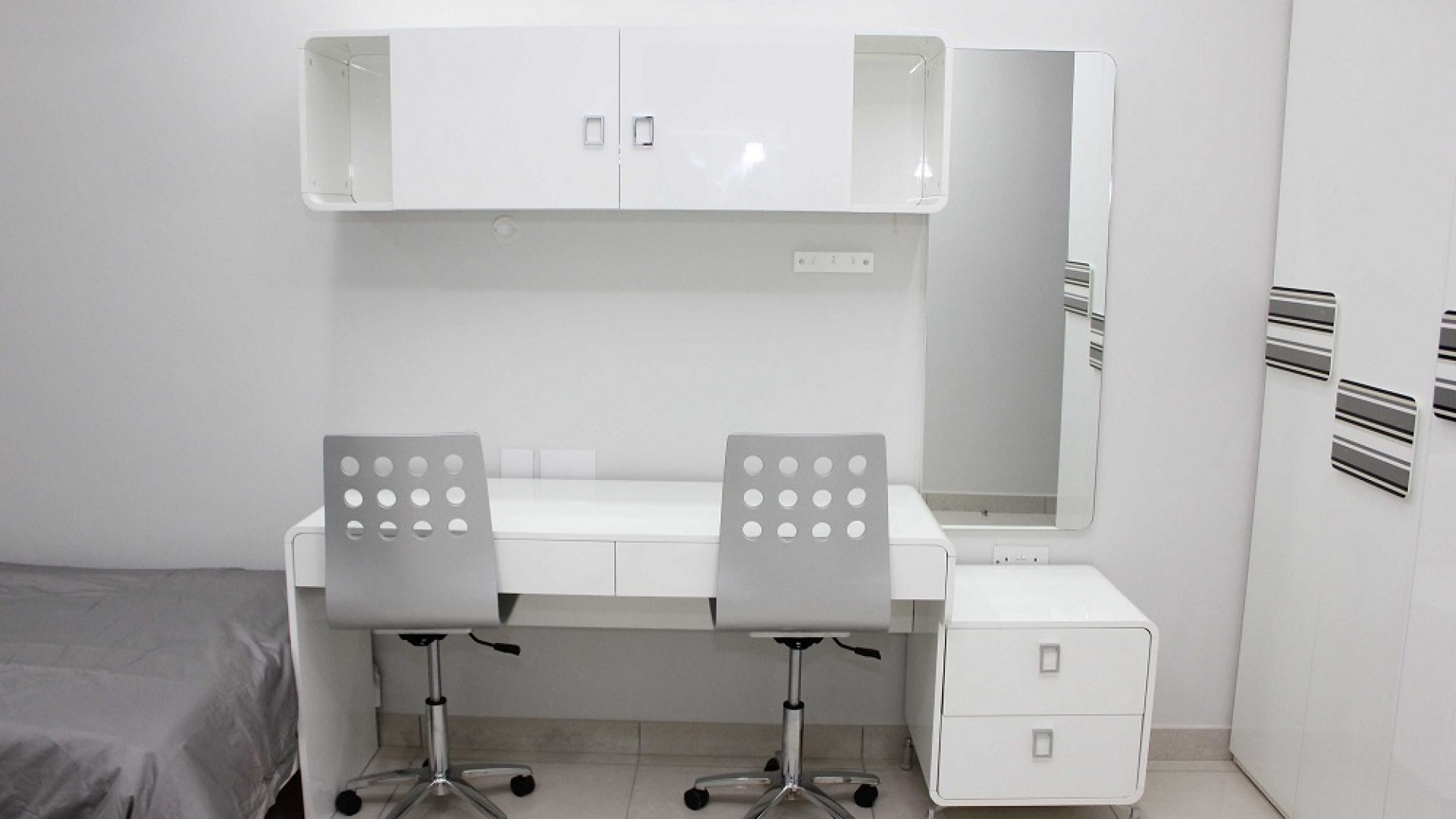 A Bedroom of the Two Bedroom Furnished Apartment in Upanga Dar es Salaam by Tanganyika Estate Agents