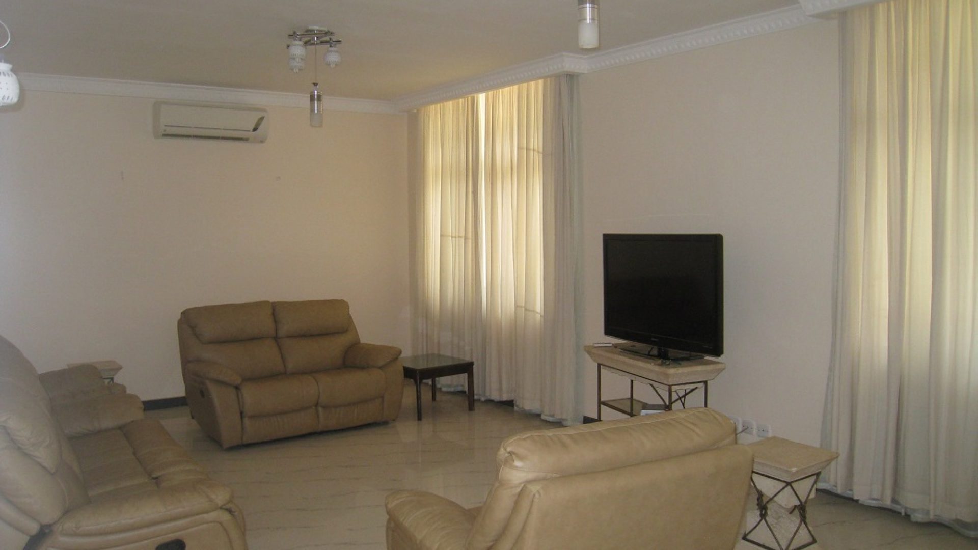 Living Room of the 4 Bedroom Furnished Apartments Ada Estate, Dar Es Salaam by Tanganyika Estate Agents