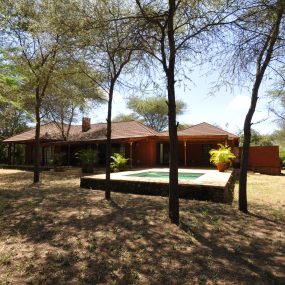 Pool in Front of the Four Bedroom House for Sale in Kili Golf, Arusha by Tanganyika Estate Agents