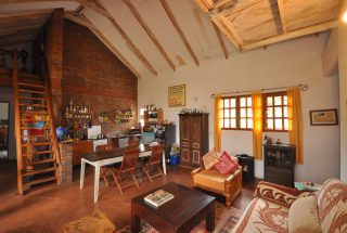Living Room & Kitchen of the 7 Bedroom Home for Sale in Mateves, Arusha by Tanganyika Estate Agents
