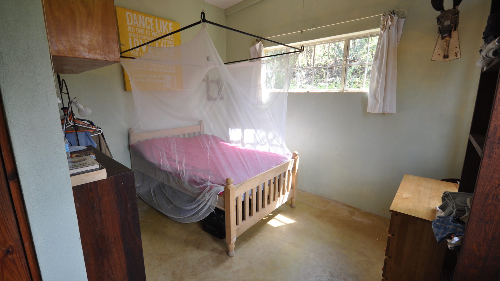 A Bedroom of the 7 Bedroom Home for Sale in Mateves, Arusha by Tanganyika Estate Agents
