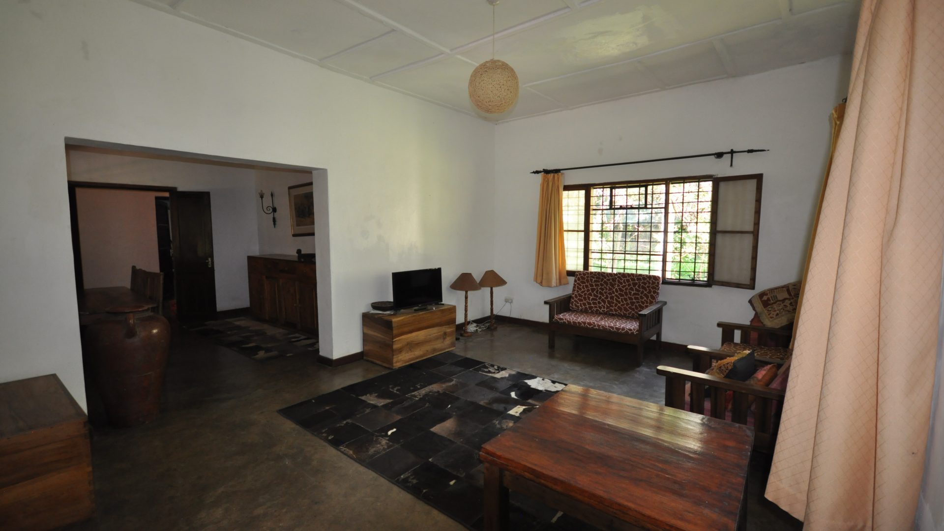 The Living Room of the 5 Bedroom Cottage for Sale in Usa River, Arusha by Tanganyika Estate Agents