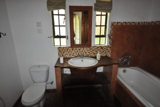 One of the Bathrooms of the 5 Bedroom Home for Rent in Usa River by Tanganyika Estate Agents