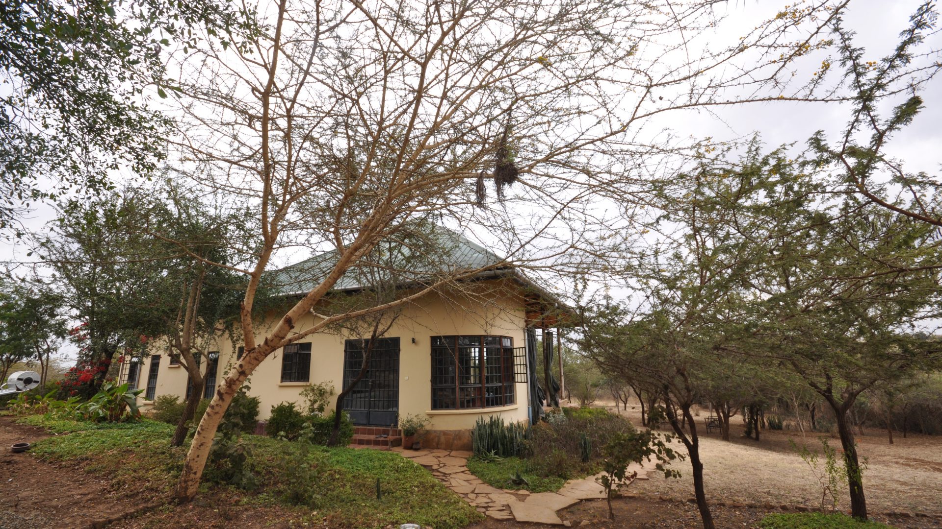 The Side View of the 2 Bedroom Home for Sale in Olasititi, Arusha by Tanganyika Estate Agents
