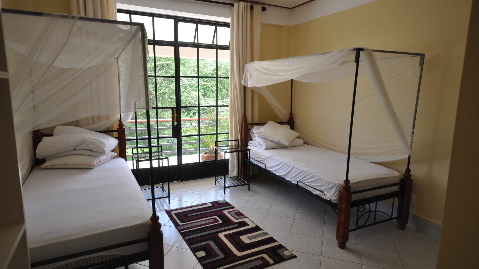 Double Bed Room of the Commercial Property for Rent in Usa River, Arusha by Tanganyika Estate Agents
