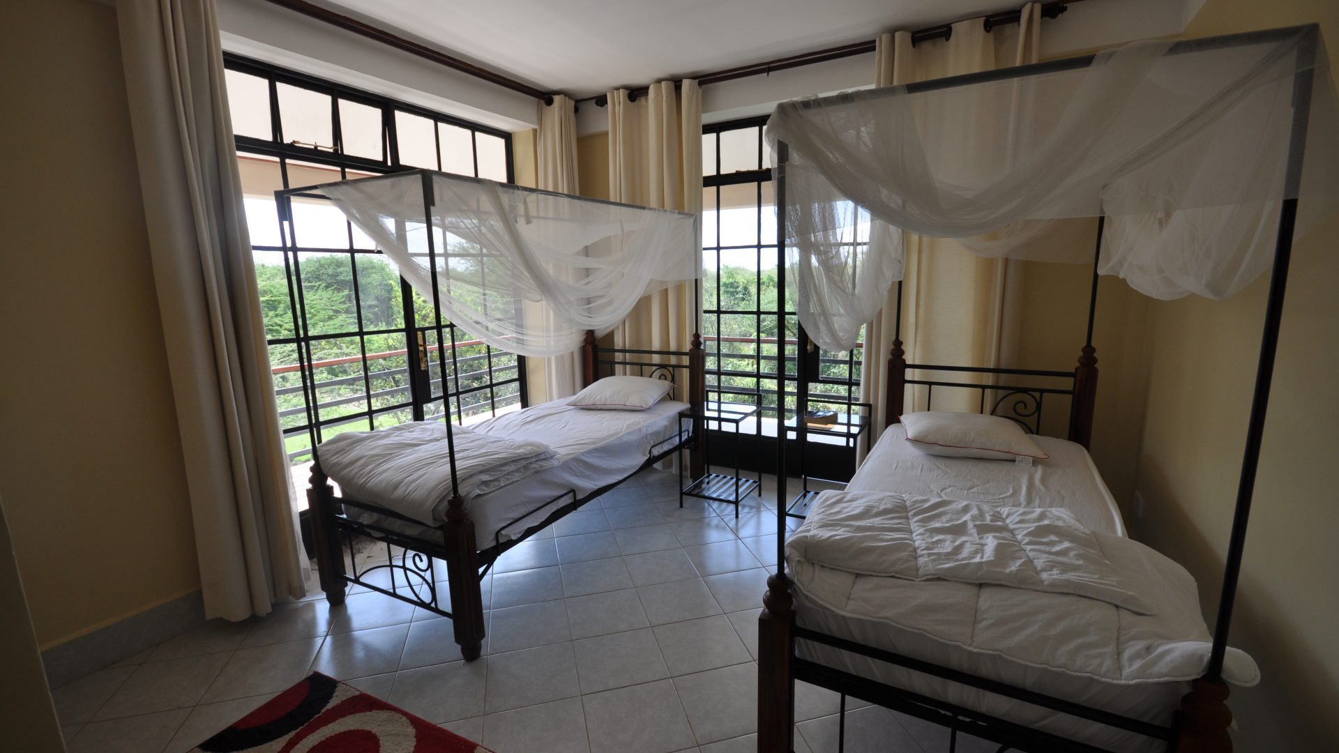 A Double Bed Room of the Commercial Property for Rent in Usa River, Arusha by Tanganyika Estate Agents