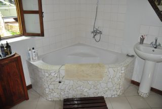 A Bathtub of the 7 Bedroom Furnished House in Ilboru, Arusha by Tanganyika Estate Agents