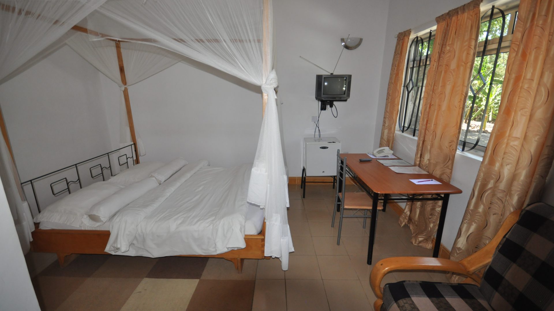 One of the Bedrooms of the 17 Room Lodge for Sale in Usa River, Arusha by Tanganyika Estate Agents