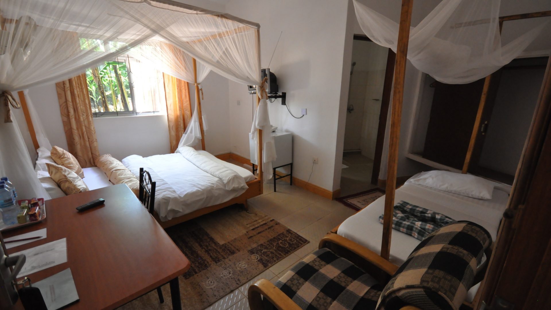 A Bedroom of the 17 Room Lodge for Sale in Usa River, Arusha by Tanganyika Estate Agents