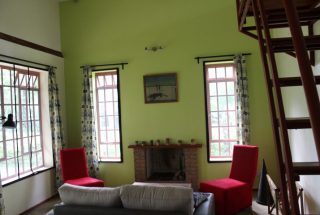 The Living Room of the Two Bedroom Cottage in Olasiti by Tanganyika Estate Agents