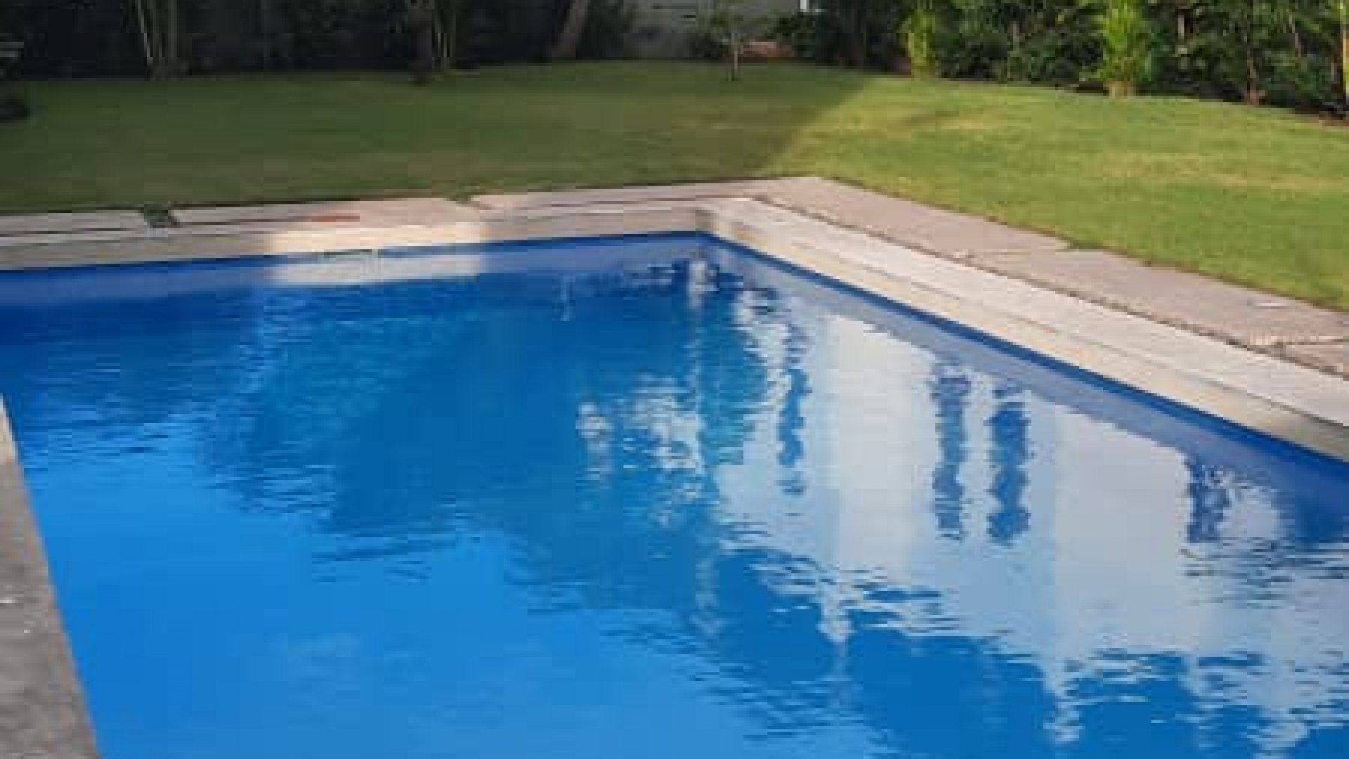 Rent this four bedroom fully furnished villa is located in a prime and safe location in Oyster Bay, Dar es Salaam. Each of the bedrooms is en-suite. Furthermore the villa enjoys an open plan that connects the living room and dining room. An oven, cooker, fridge and a microwave are also part of the kitchen furnishings. Moreover the furnished villa has access to the DSTV network, access to a private balcony and air conditioning for every room. Furthermore additional facilities include a swimming pool. In addition there is ample parking on the property for all the tenants. A wall also surrounds the home with a security alarm installed with 24/7 security onsite. Therefore the security of the furnished villa will not be an issue. Tanesco power with luku meter and a backup generator also supplies the electricity needs of the property. DAWSA likewise supplies the water needs of the furnished apartments and the rest of the property. This four bedroom furnished villa is also an example of the full spectrum of high quality homes in Oyster Bay offered by Tanganyika Estate Agents. View more properties in the city of Dar es Salaam from Tanganyika Estate Agents.